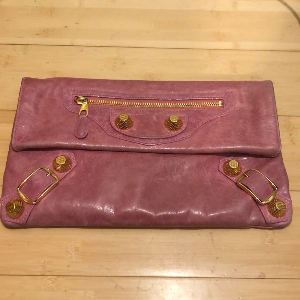Balenciaga clutch. Rose pink color with gold accents.